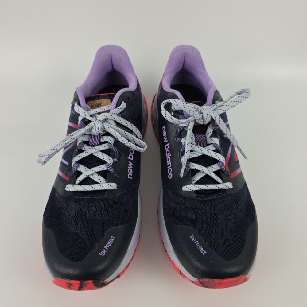 New Balance Black and Purple Athletic Shoes with Modern Design